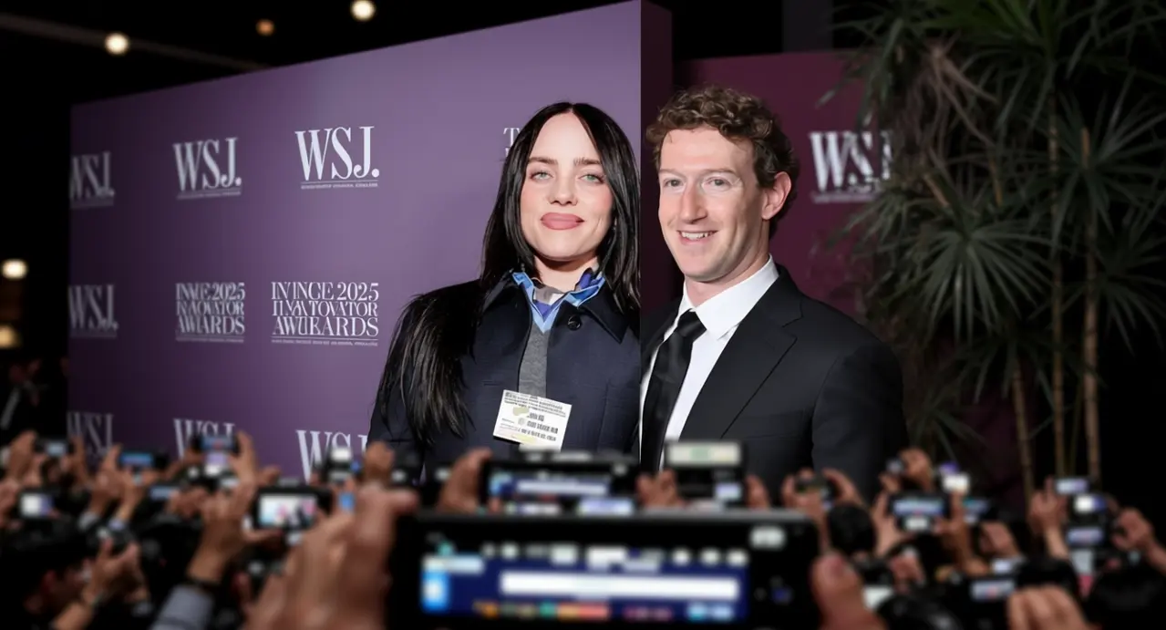 Due persone posano davanti ai fotografi a un evento pubblico con sfondo stampa WSJ.